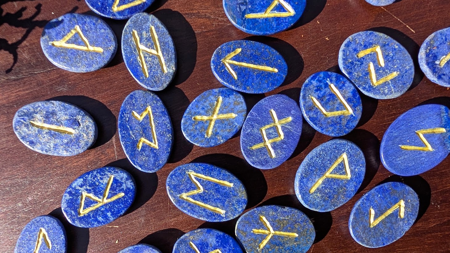 Hand Carved Elder Futhark Rune Set - 970 Ct of Lapis Lazuli with Gold Pyrite - up close