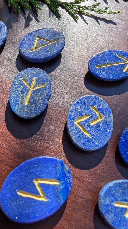 Hand Carved Rune Set on 970 Ct of Lapis Lazuli - up close
