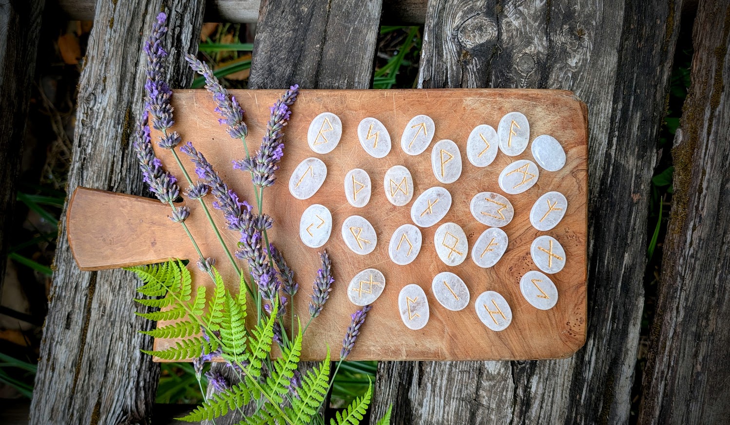 Hand carved Elder Futhark Rune set on 945 Ct of Natural White Quartz