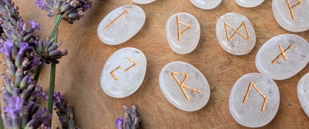 Hand carved Elder Futhark Rune set up close - on 945 Ct of Natural White Quartz